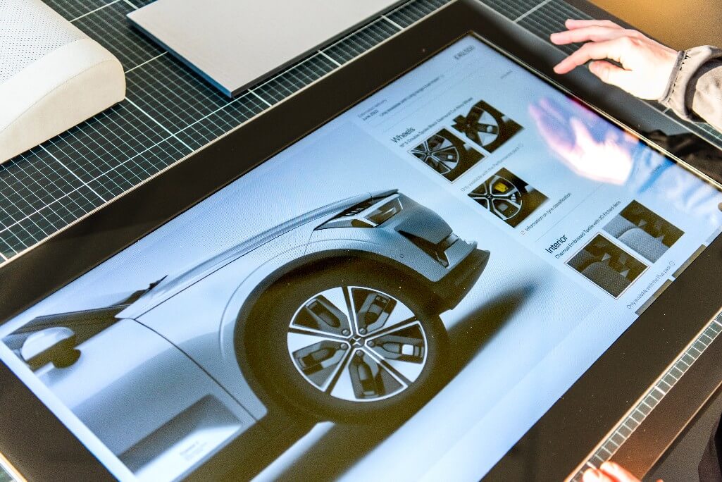 Someone using the Polestar touch screen.