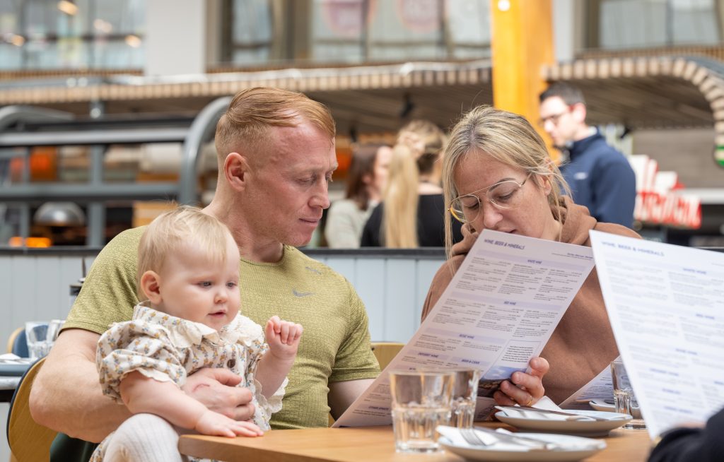 A family browsing the menu at The Real Greek.  Sandy Young/scottishphotographer.com