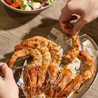 A dish of Souvlaki king prawns